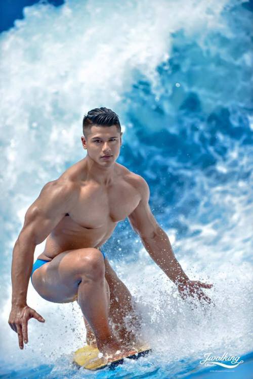 Surfer riding wave