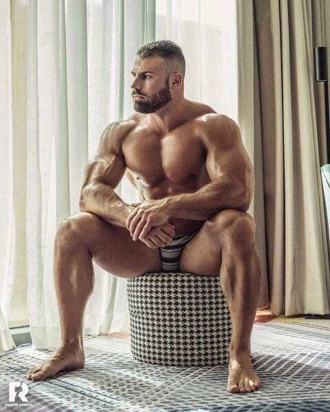 Bearded-Muscular-Manspreading