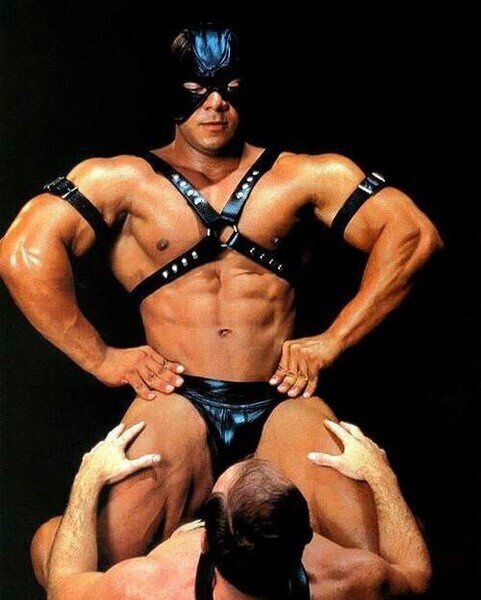 Muscular Leather Master-Slave On His Knees