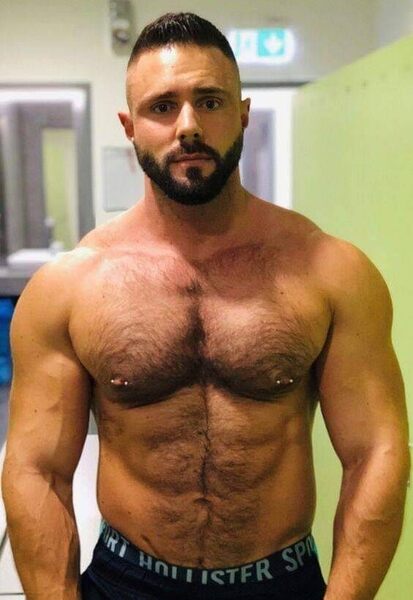 Trimmed beard - muscle - hairy chest - nipple piercings