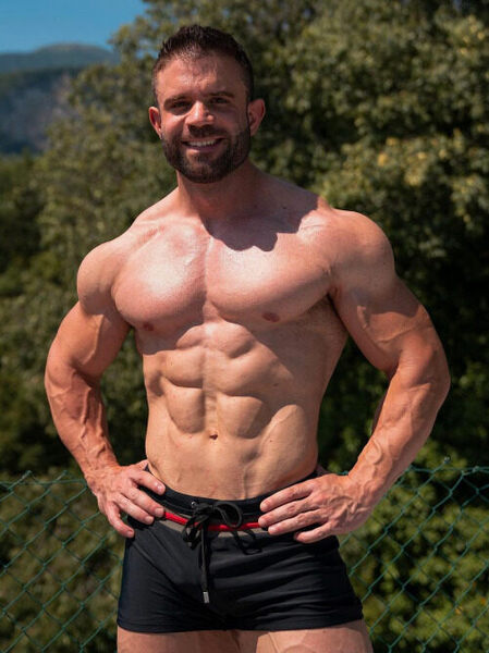 Clean cut big muscle - trimmed beard - smile