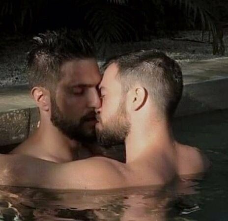 Night time pool kissing