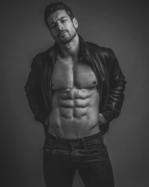 Leather jacket abs and pecs…