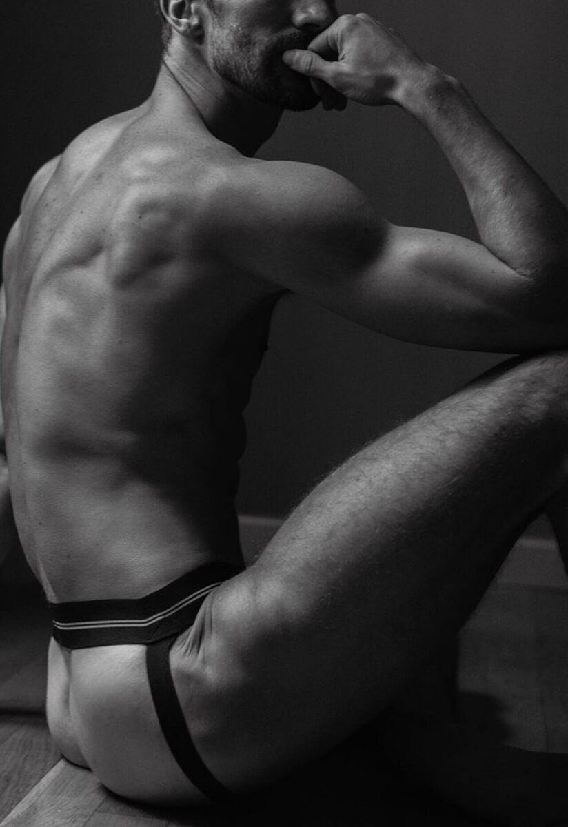 His mostly black jockstrap in black and white can be hot!