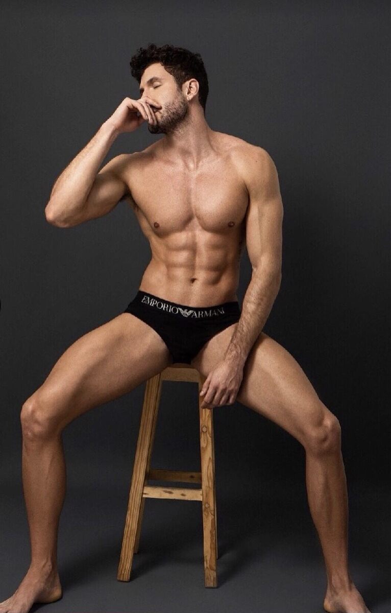 Man spreading on a stool