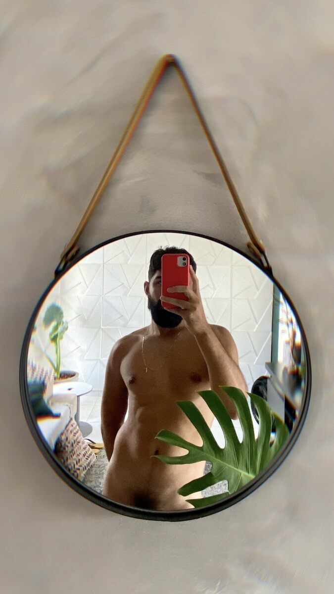 In the mirror hanging on the wall