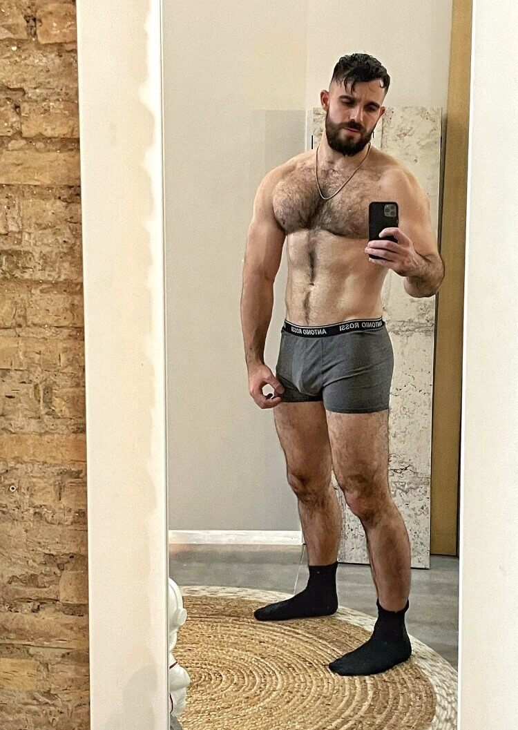 Why are you focusing of the rug and his socks!  Really!!!