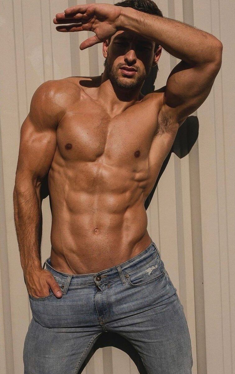 Muscular beauty in faded denim