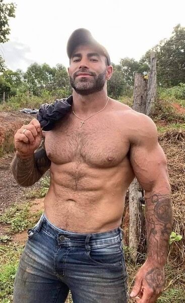 Working it outdoors shirtless in jeans