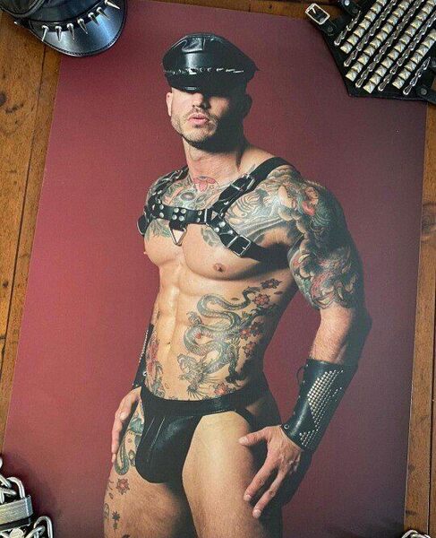 Harnessing the power in his black leather jock