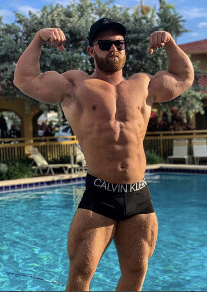 Mr. Double Front Biceps poolside
