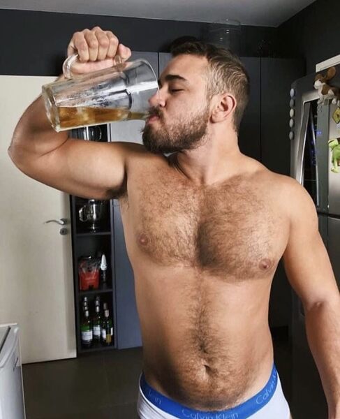 Not sure what he’s guzzling, but I doubt it is a protein drink.