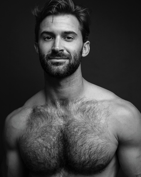 His hairy chest and enigmatic smile