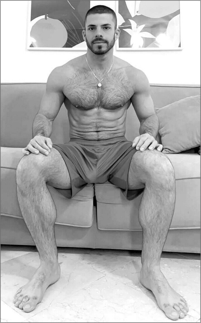 Hot man spreading on the couch
