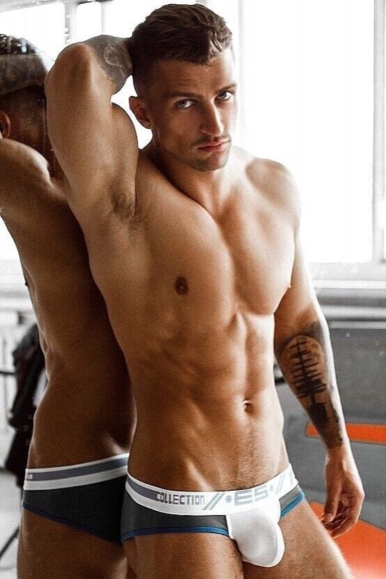 Leaning against the mirror mirror on the wall.