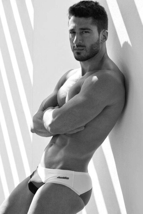Leaning against the wall