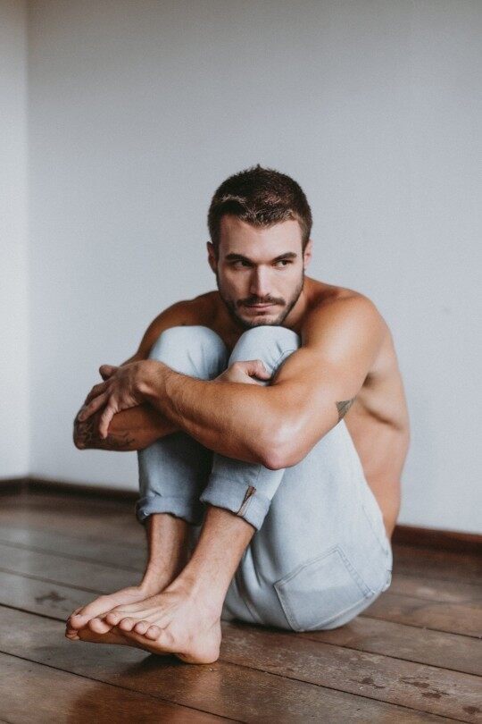 Sitting on the hardwood floor