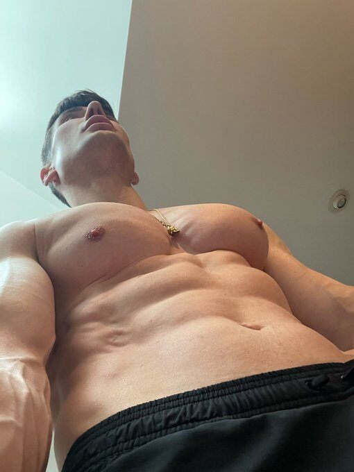 Waiting for the guy on his knees to rip off his shorts.