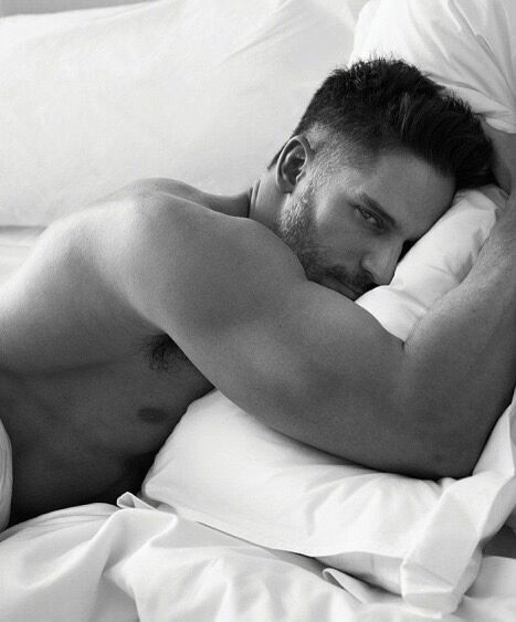 Hugging his pillow, but he would prefer to be hugging you…