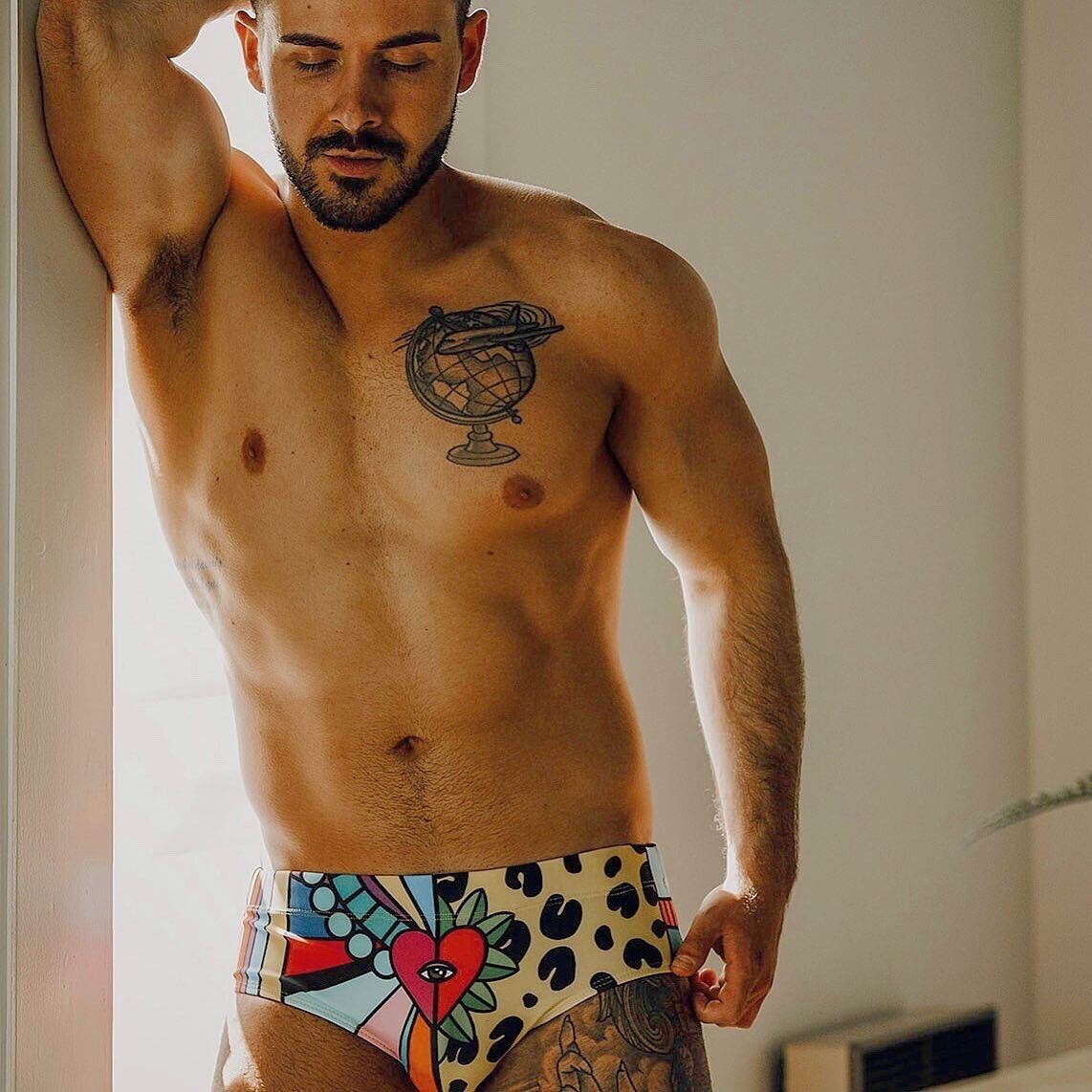 And your eye is focused right on the heart as depicted on his swim suit.