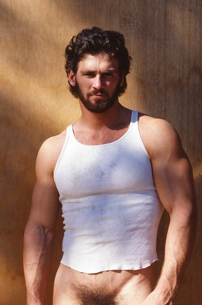 Likes to wear a wife beater even though he has a husband!
