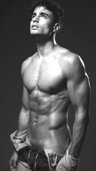 Showing his pubes