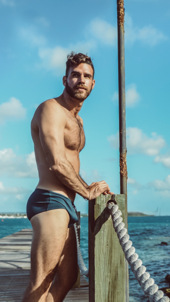 On the dock waiting for his ship to cum in