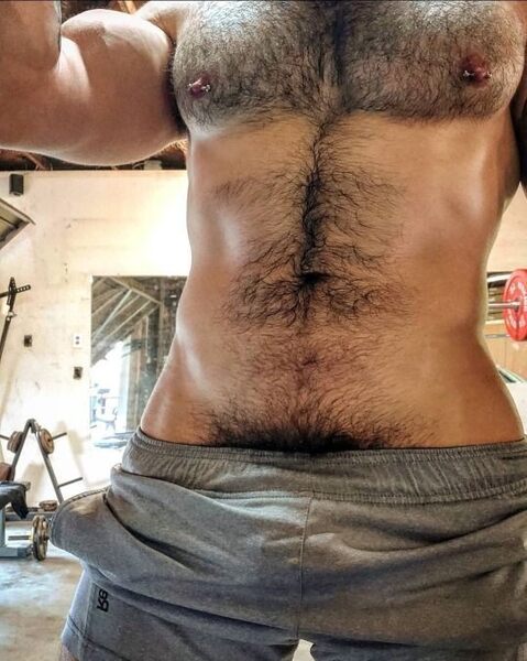Pierced nips and pubes showing torso.