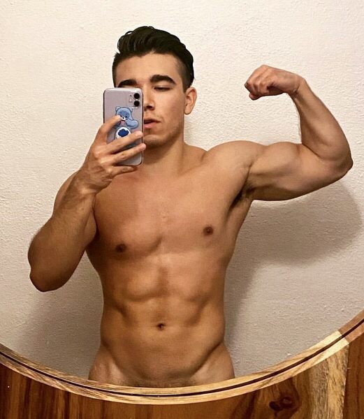 Perfectly centered selfie in that classic mirror on the wall.