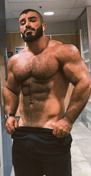 Big muscle about to reveal his equipment…