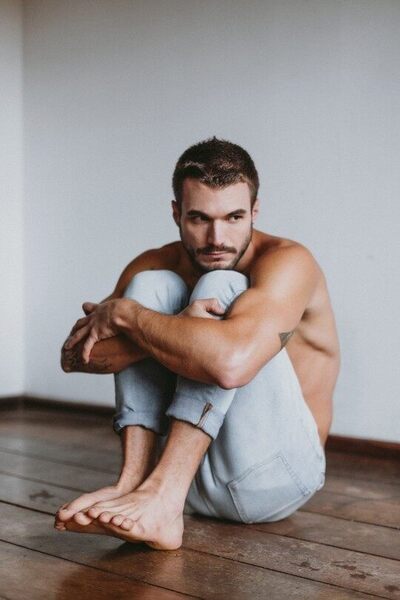 Sitting on the hardwood floor