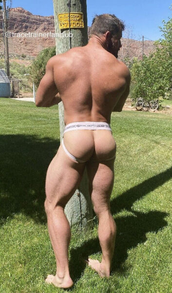 Awesome rear view nicely framed with his white jockstrap.