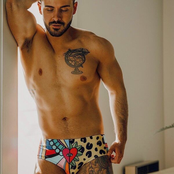 And your eye is focused right on the heart as depicted on his swim suit.