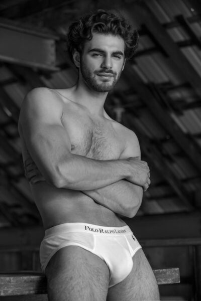 His folded arms…