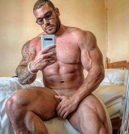 His on the corner of the bed selfie