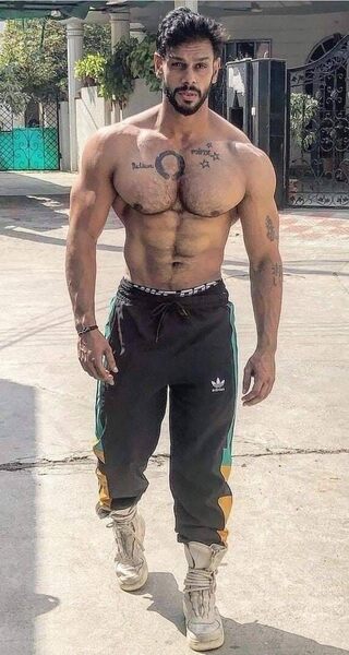Just how you like him: hot, sweaty, and just back from the gym.