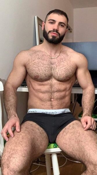 He’s a man… and he’s spreading… not a lot but enough to make ya wanna jump him!