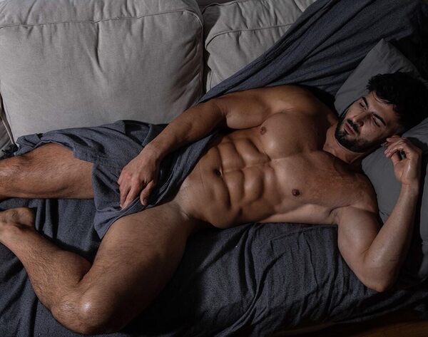 Of course you would jump on that couch and have your way with every inch of what he has to offer!