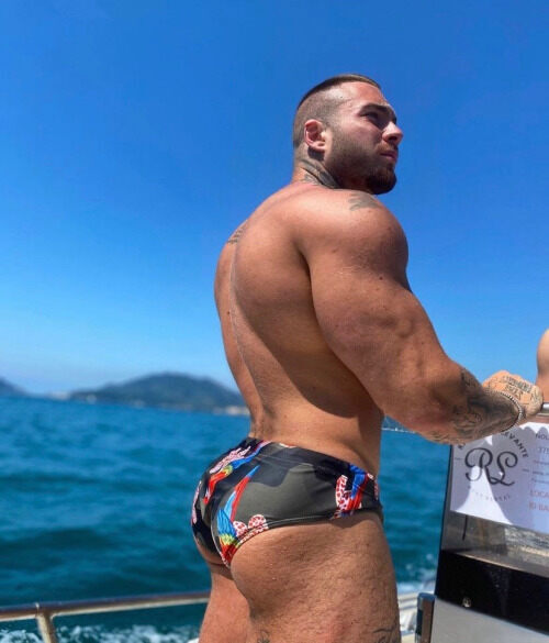 His butt against the deep blue sea
