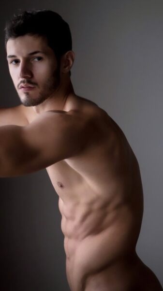 He knows you want to lick his abs… and more…