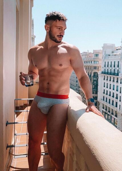 On his balcony sipping his scotch… and I’m guessing liking what he sees…