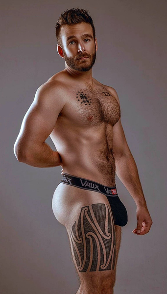 He wears that pouch thong quite well