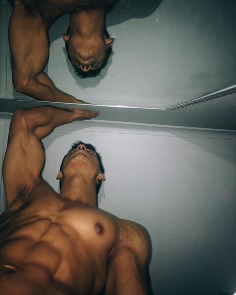 Checking out the mirror on his ceiling