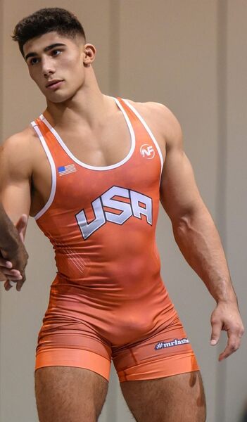 He wears that singlet quite well