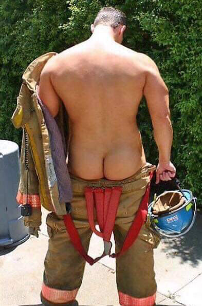 Checking to make sure all his equipment is ready to put out the fire.