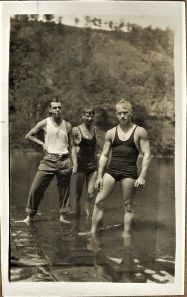 Swimming hunk and his groupies