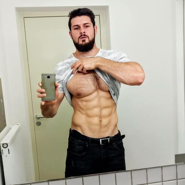 hairy-muscle-bare-chest-pecs-dark-bearded-hunk.jpg