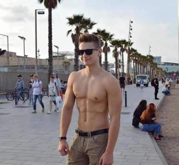young-teen-college-boy-smiling-shirtless-fit-body-sunglasses.jpg