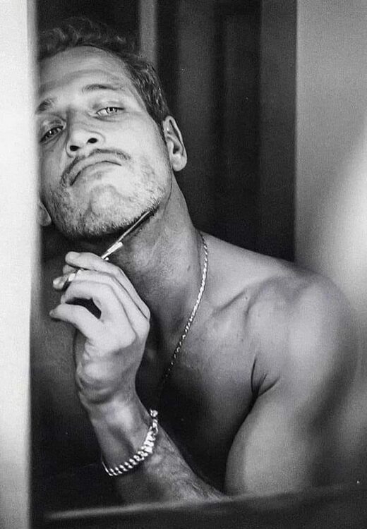 Paul Newman Trimming Beard.jpg