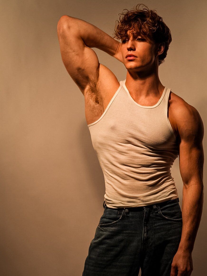 Guys in white ribbed undershirts